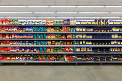 View of supermarket interior snacks section