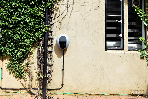 Wall mounted car charging unit to supply power to electric vehicles