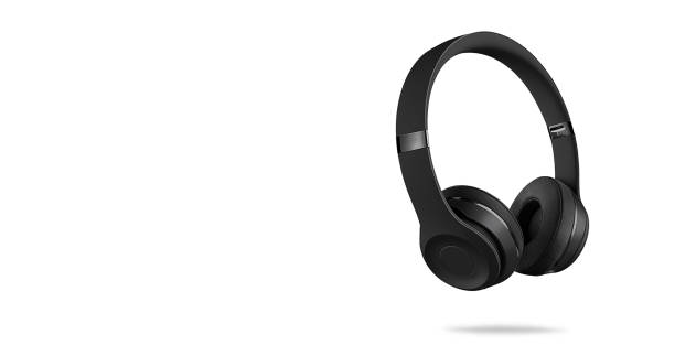 Headphones with copy space on a white background Wireless headphones with copy space on a white background black and white headphones stock pictures, royalty-free photos & images