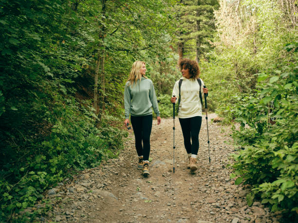 Women Friends Hiking Outdoors stock photo