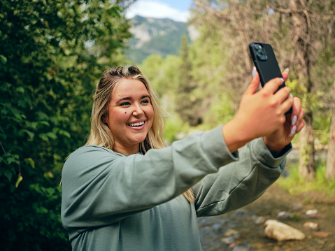 A young woman enjoying the outdoors.