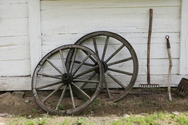 istock wooden wheels for the cart 1412259565