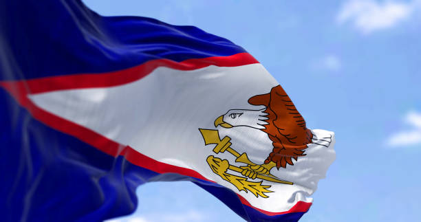istock The American Samoa flag in the wind on a clear day 1412259613