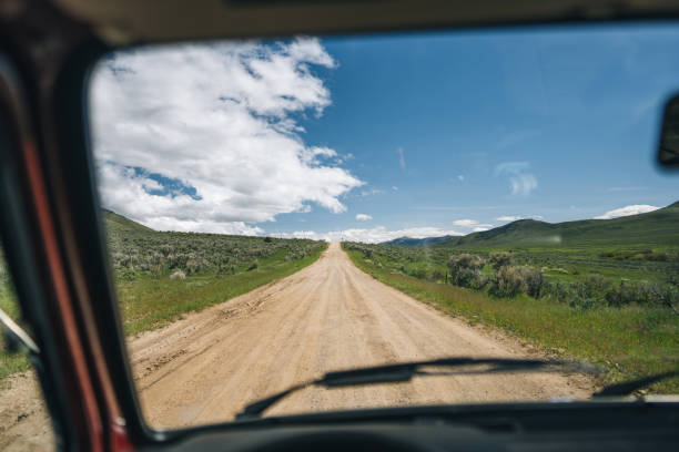 Dust on a dirt road behind a car, Russia