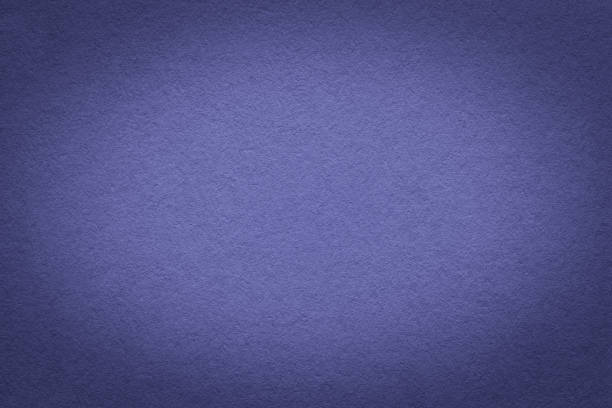 istock Texture of vintage dark violet paper gradient background with dark vignette. Structure of dense craft lavender cardboard 1412261840