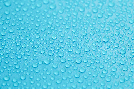 Water drops pattern on blue background