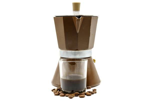 istock Italian coffee maker, cup with coffee and coffee beans. Isolated on white background 1412265566