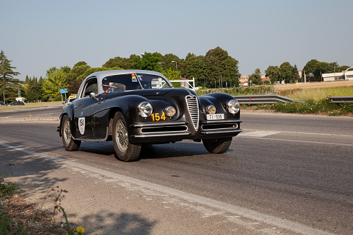 vintage Italian sports car Alfa Romeo 6C 2500 SS Coupe Touring (1949) in classic race Mille Miglia, in Forlimpopoli, FC, Italy, on June 16, 2022