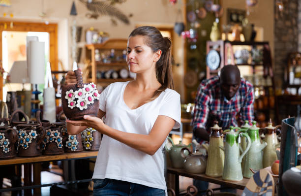 istock Woman looking for handmade ceramics 1412266972
