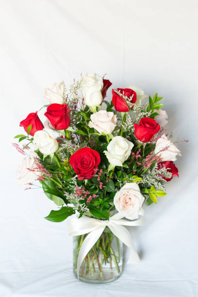 istock 2 dozen red and white rose arrangement 1412269300