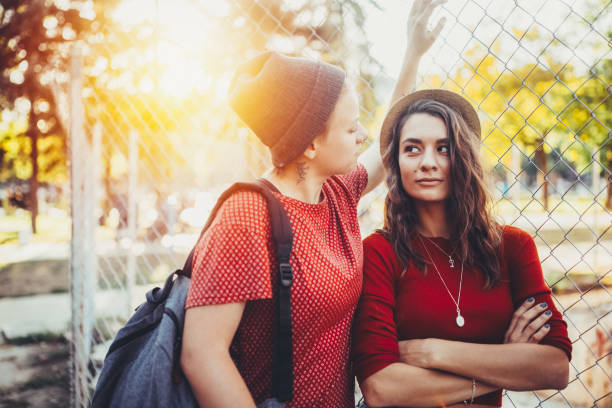 istock Lesbian couple flirting outside 1412270974