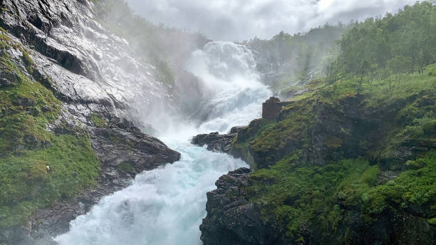 istock Kjossfossen waterfall view from Flam Myrdal railroad stop 2 1412271411
