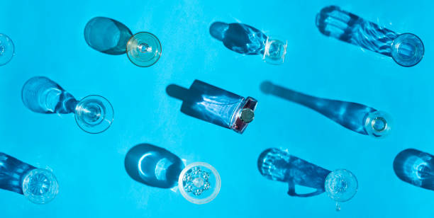 istock shadows of multiple glasses on bright blue background 1412273250