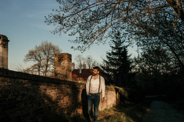 istock Man walking on a autumn day 1412274404