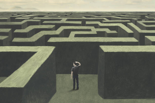 istock Illustration of man lost in a complex labyrinth, surreal abstract concept 1412278077