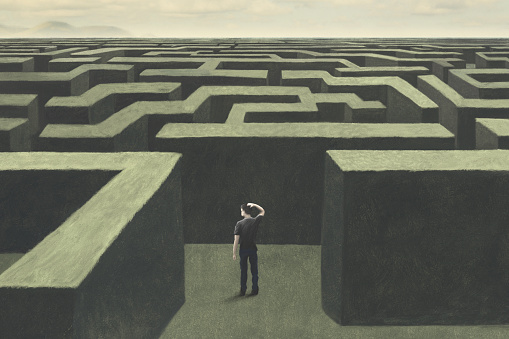 Illustration of man lost in a complex labyrinth, surreal abstract concept