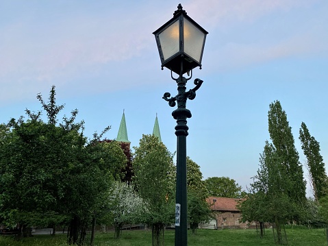 Village view with idyllic streetlight in forground