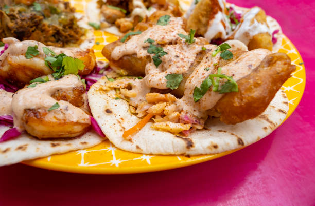 Assorted Mexican Tacos on Colorful Backgrounds