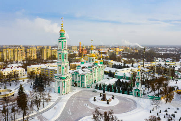 View from drone of Tambov Transfiguration Cathedral on winter day View from drone of Tambov Transfiguration Cathedral on background with cityscape on sunny winter day, Russia tambov oblast photos stock pictures, royalty-free photos & images
