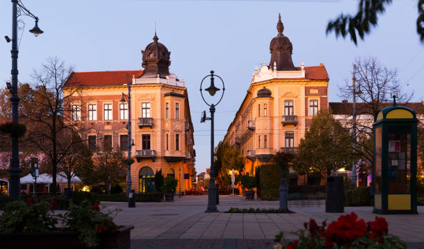 Impressive architecture of Debrecen streets at sunset, Hungary