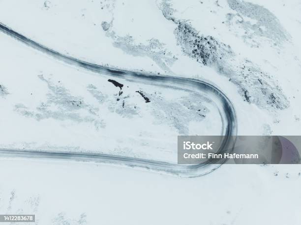 Aerial View Of A Curvy Road In Winter Iceland Stock Photo - Download Image Now - High Angle View, Iceland, Road