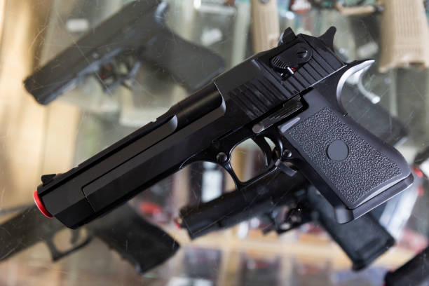 istock Replica of handgun on showcase 1412286362