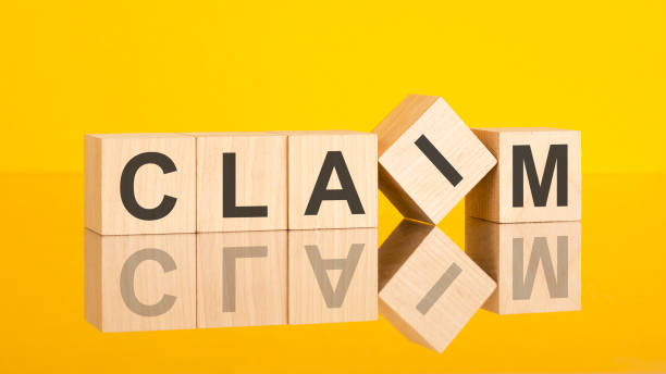 istock CLAIMS - text written on wooden cubes, business concept 1412292810