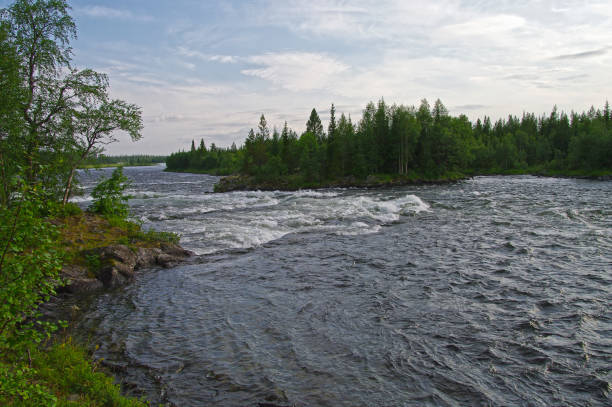 The end of the Pasun rapids on the Umba river, Kola Peninsula, Murmansk Oblast, Russia. Sunny day in August.
