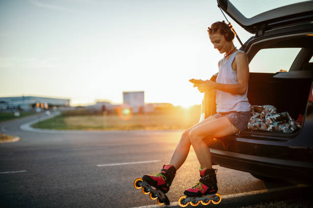 istock Mature woman roller skating outdoors 1412294829