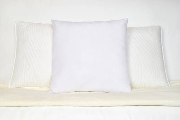 istock White Throw Pillow Mockup on Plush White Couch 1412296004