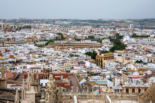 Seville is the capital and largest city of the Spanish autonomous community of Andalusia and the province of Seville. It is situated on the lower reaches of the River Guadalquivir, in the southwest of the Iberian Peninsula.