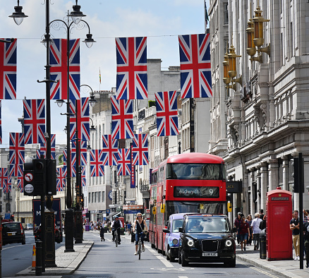 London, UK. 10th May 2022. Union Jack flags on Oxford Street for the Queen's Platinum Jubilee, marking the 70th anniversary of the Queen's accession to the throne.