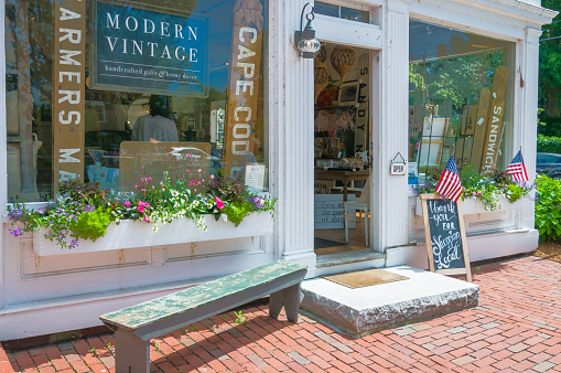 Shelby, NC, USA-28 March 2022: A wide angle view of a block of colorful specialty shops in early spring on 100 block of East Warren St.