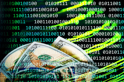 Binary code abstract background with US $100 dollar banknotes. Shallow depth of field.