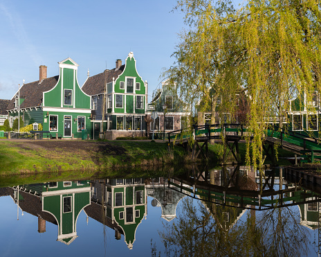 Traditional houses reflected in the waterfront at Zaanse Schans, Netherlands