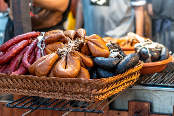 Different Types of Sausages in a Basket at the Feira Medieval de Alvor Different Types of Sausages in a Basket at the Feira Medieval de Alvor alvor stock pictures, royalty-free photos & images