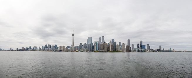 a picture of a Skyline view of Toronto Ontario across the water
