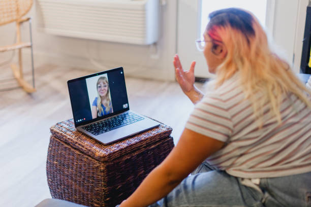 istock Patient Meeting Remotely with her Doctor 1412316796