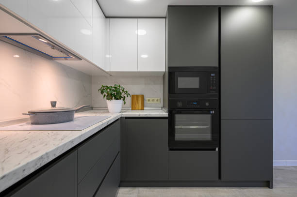 modern simple trendy dark grey and white kitchen