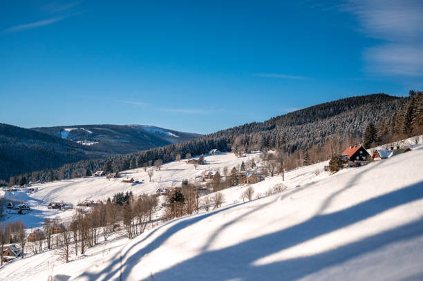 istock Sunny day in the winter mountains 1412327136