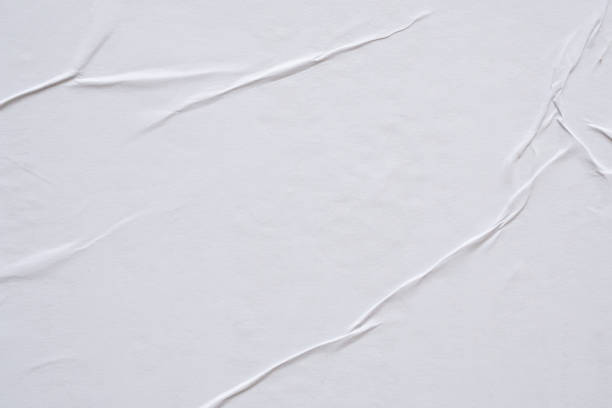 istock white crumpled and creased paper poster texture background 1412328813