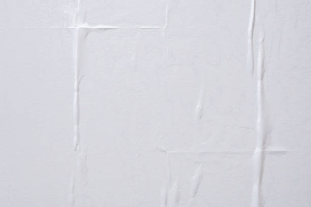 istock white crumpled and creased paper poster texture background 1412328830