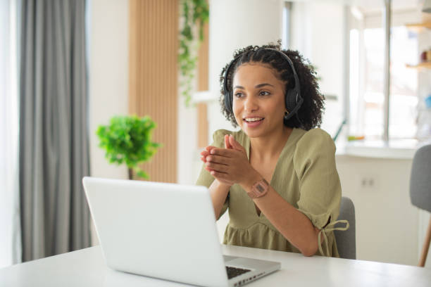 istock Young businesswoman working in a call center 1412329123