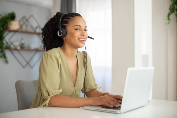 istock Young call center agent working in an office 1412329124