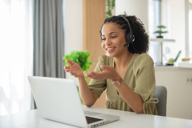 istock Young call center agent working in an office 1412329135