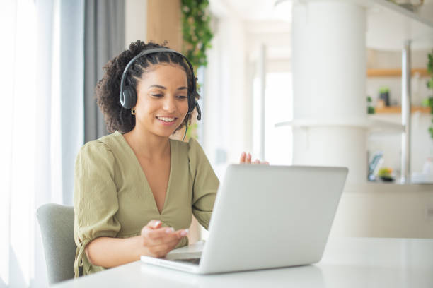istock Young call center agent working in an office 1412329153