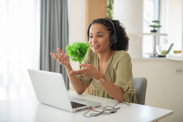 istock Young call center agent working in an office 1412329172