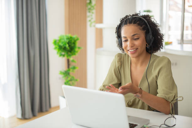 istock Young call center agent working in an office 1412329174