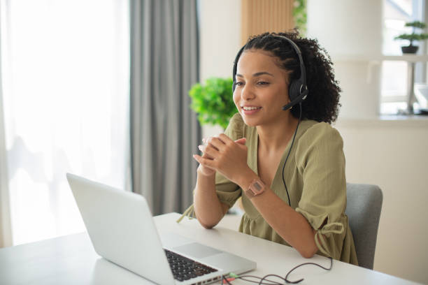 istock Young businesswoman working in a call center 1412329176