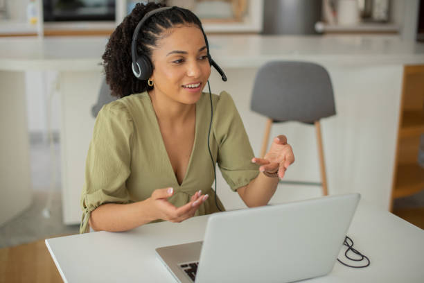 istock Young call center agent working in an office 1412329180